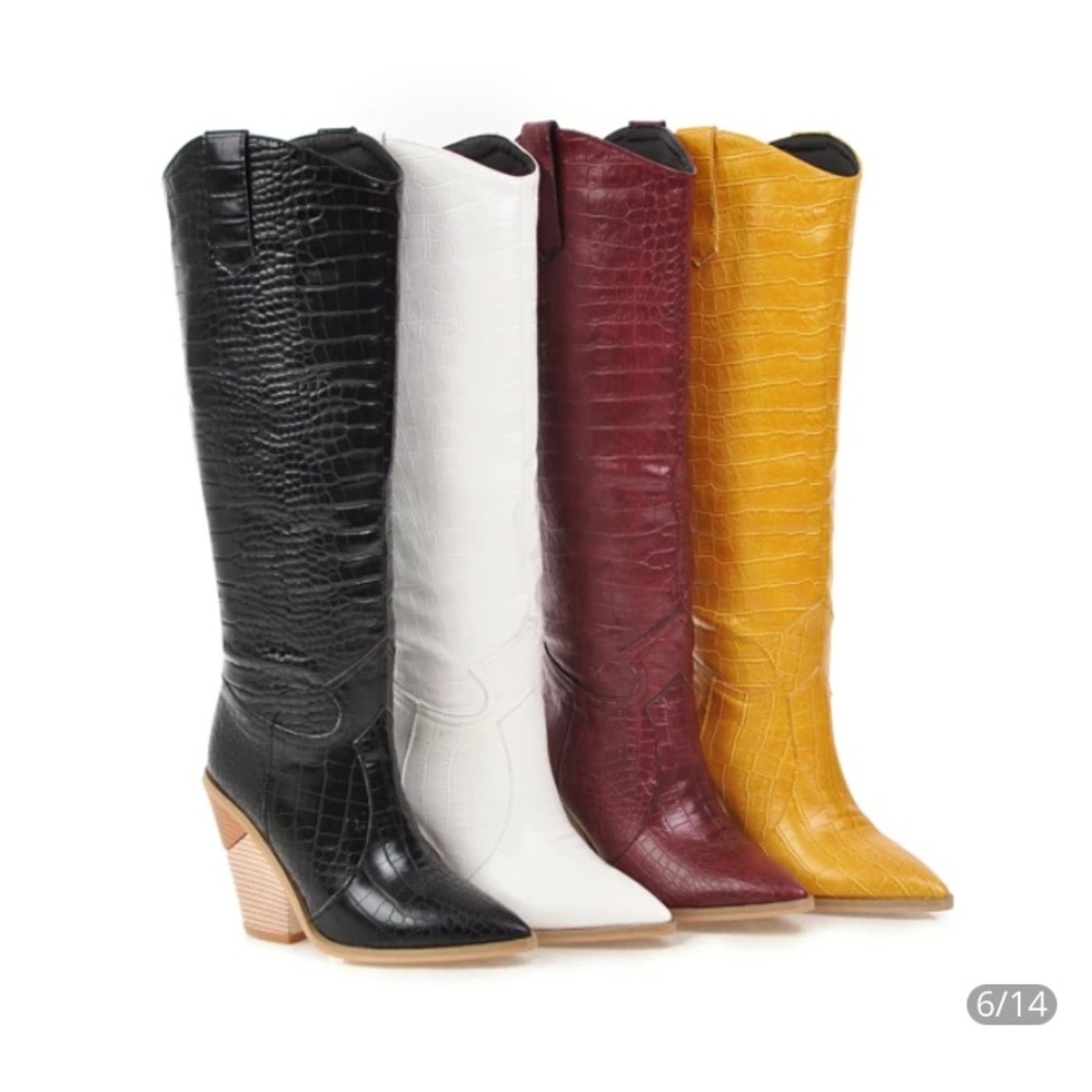 Woman’s knee high cowgirl boots